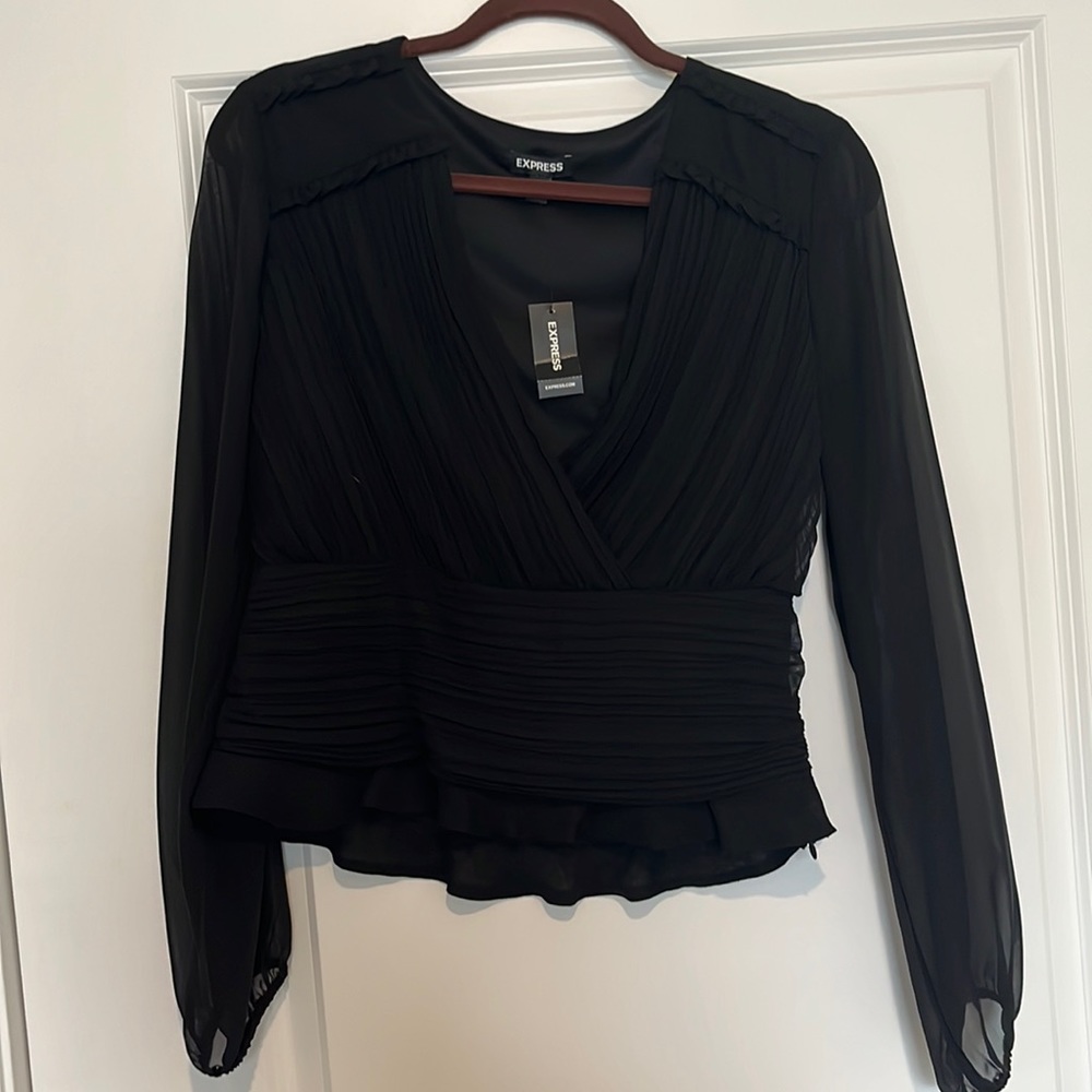 Express blouse with sheer sleeves. Size medium. NWT